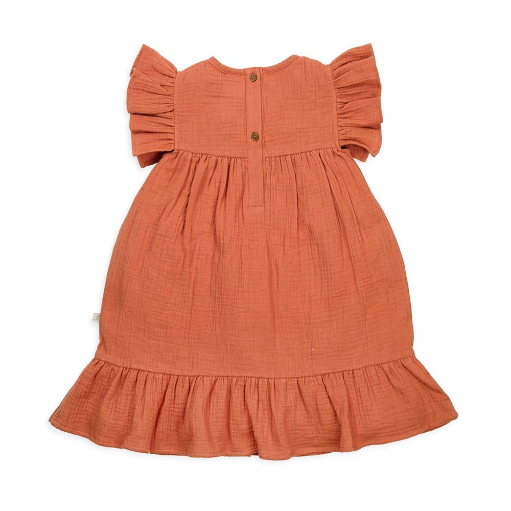 Back View of Tiny Twig Peasant Dress In Caramel